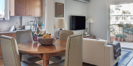 Bright, modern city apartment with balcony – example of current urban living trends in major cities