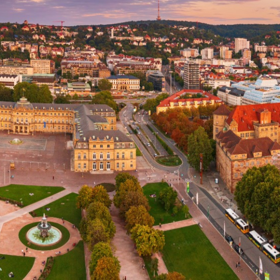 Aerial view of Stuttgart city center with castle's courtyard at sunset